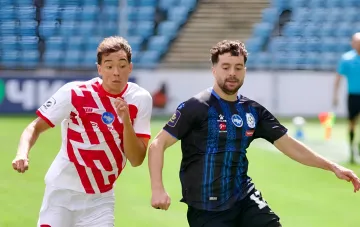 Chornomorets player in red-and-white kit during the UPL match that gave the Odesa side their first win of the season