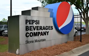 Pepsi Beverages Company sign at a PepsiCo production facility damaged by shelling in the Mykolaiv region