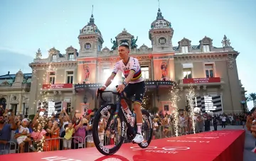 Tadej Pogacar in the world champion jersey at the Vuelta presentation — the rider who later crashed out on stage 8