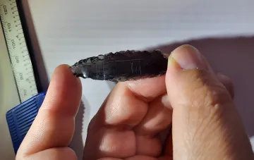 Ancient obsidian arrowhead with un deciphered geometric signs found in Turkey