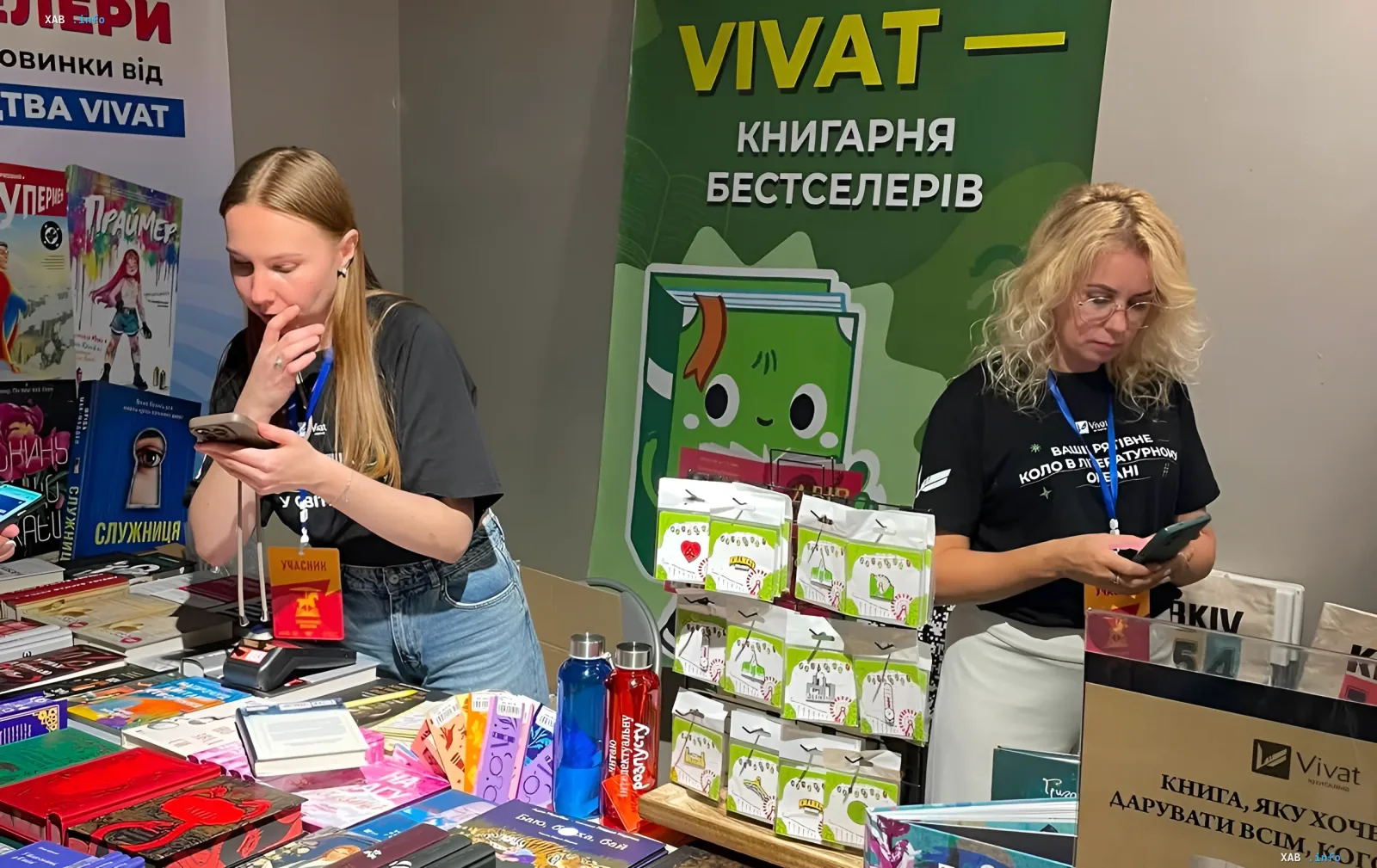 Staff of the VIVAT bookstore chain at a book fair stand in Ukraine — the book market under pressure from warehouse shelling