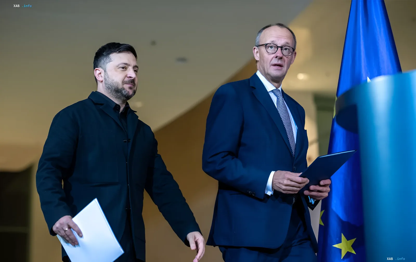 Украинский и немецкий лидеры на фоне флага ЕС в контексте плана ответных мер Германии против России и усиления помощи Украине