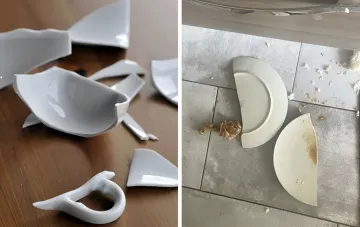 Broken white cup and shattered plate fragments on the floor — folk superstitions about broken dishes