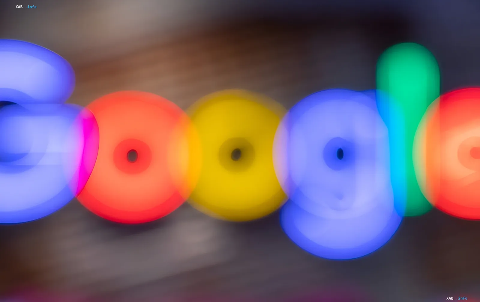 Vibrant colorful rings in Google's brand style — visualization of the September Android Drop update with Gemini in Find Hub