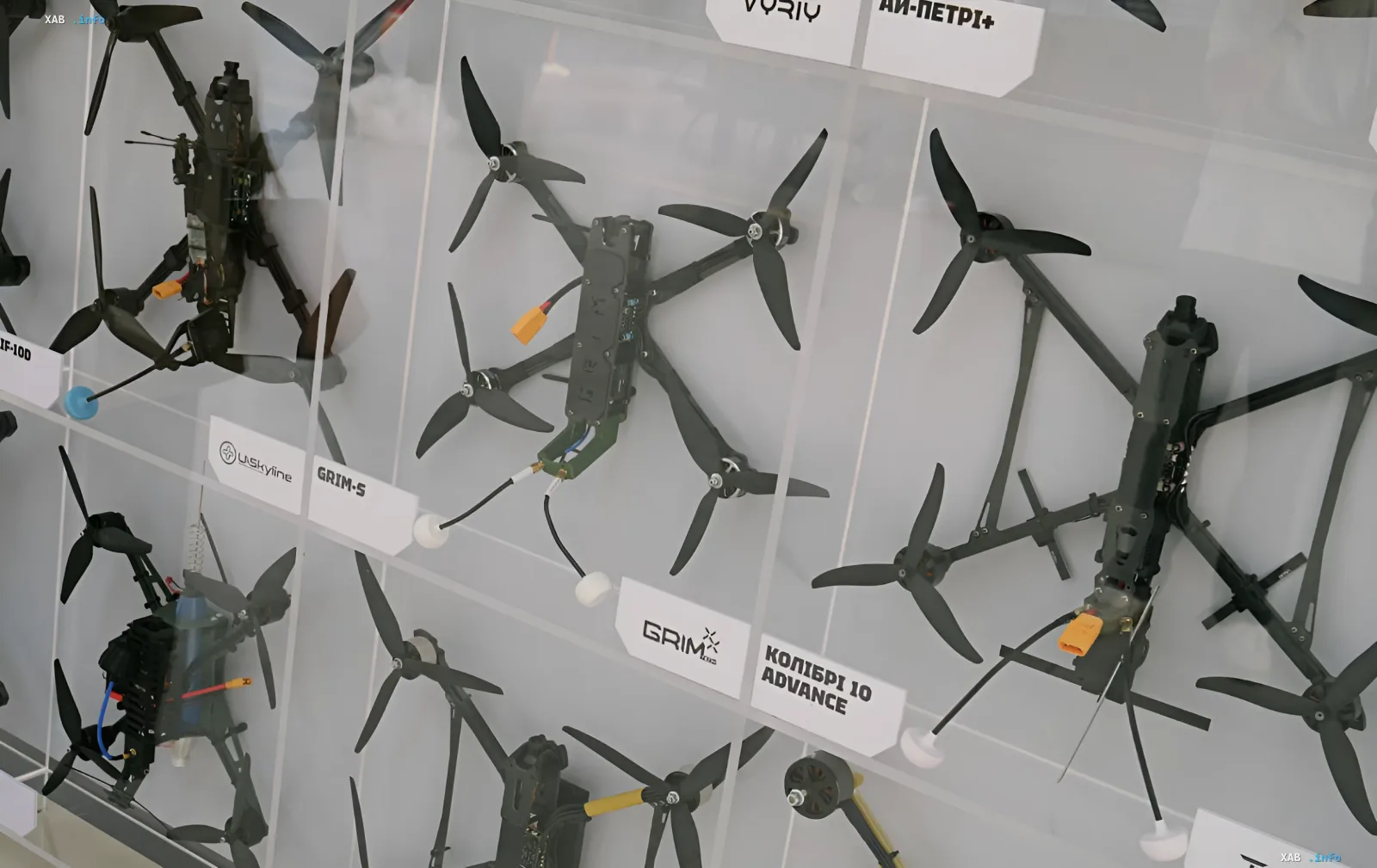 Display case with Ukrainian combat drone models at the interactive DOT-Chain Defence ordering installation in Kyiv