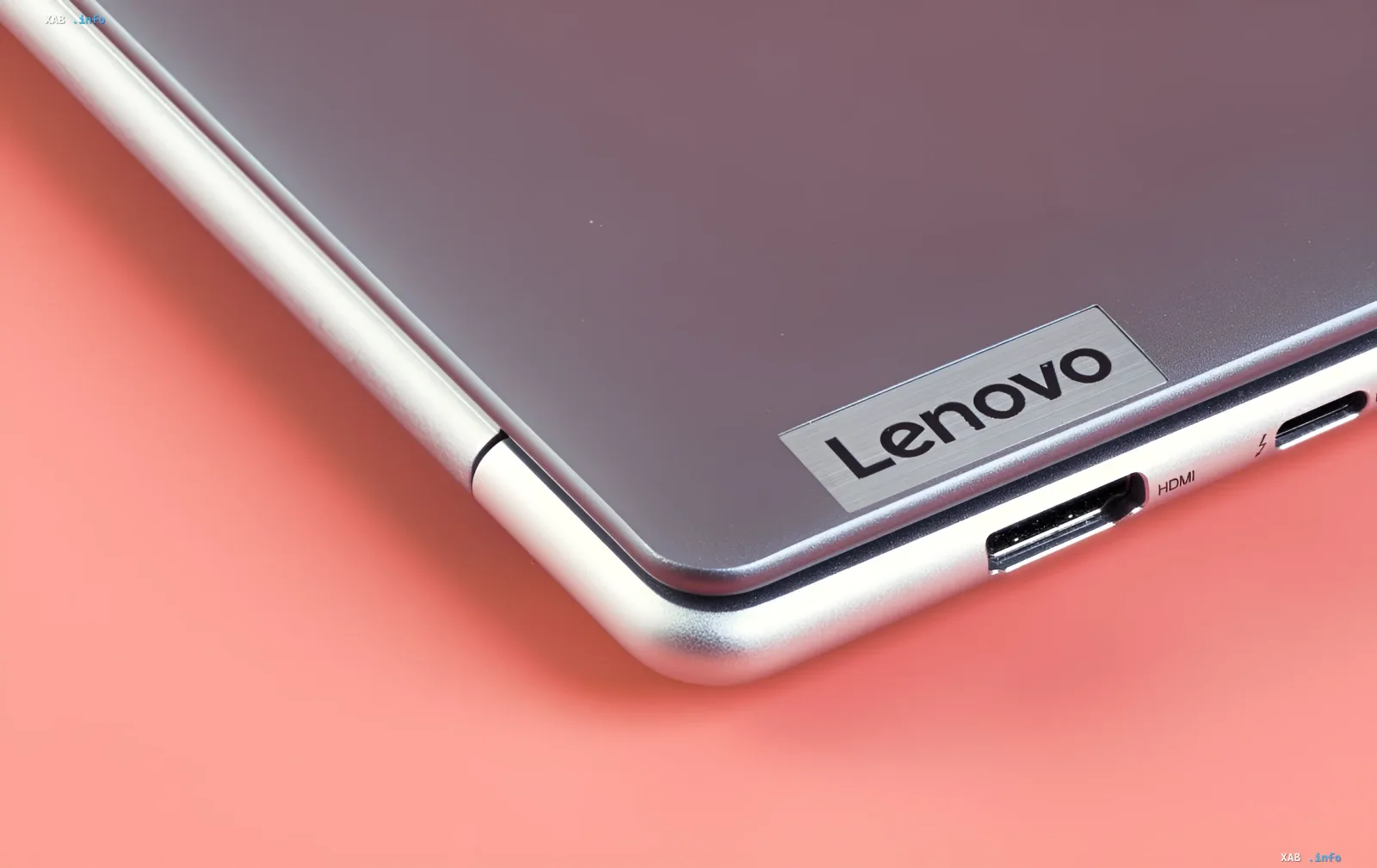 Close-up of a Lenovo concept laptop corner featuring the brand logo and an HDMI port