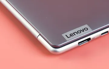 Close-up of a Lenovo concept laptop corner featuring the brand logo and an HDMI port