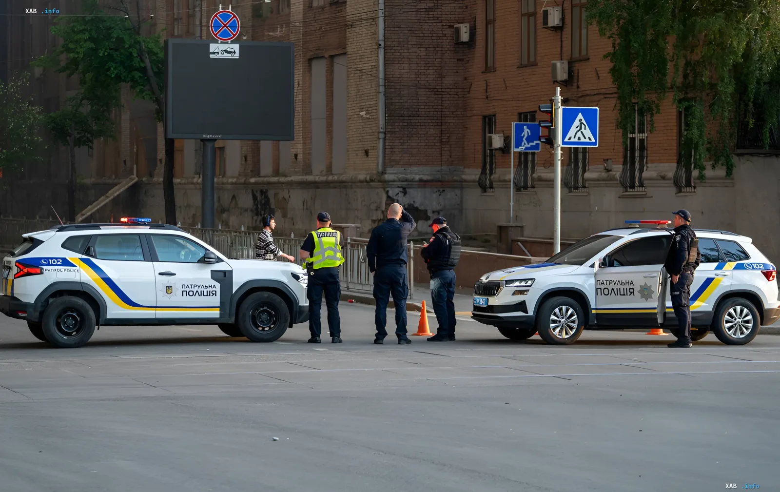 Patrol police officers at the scene of an explosive incident in Kyiv's Svytoshyn district