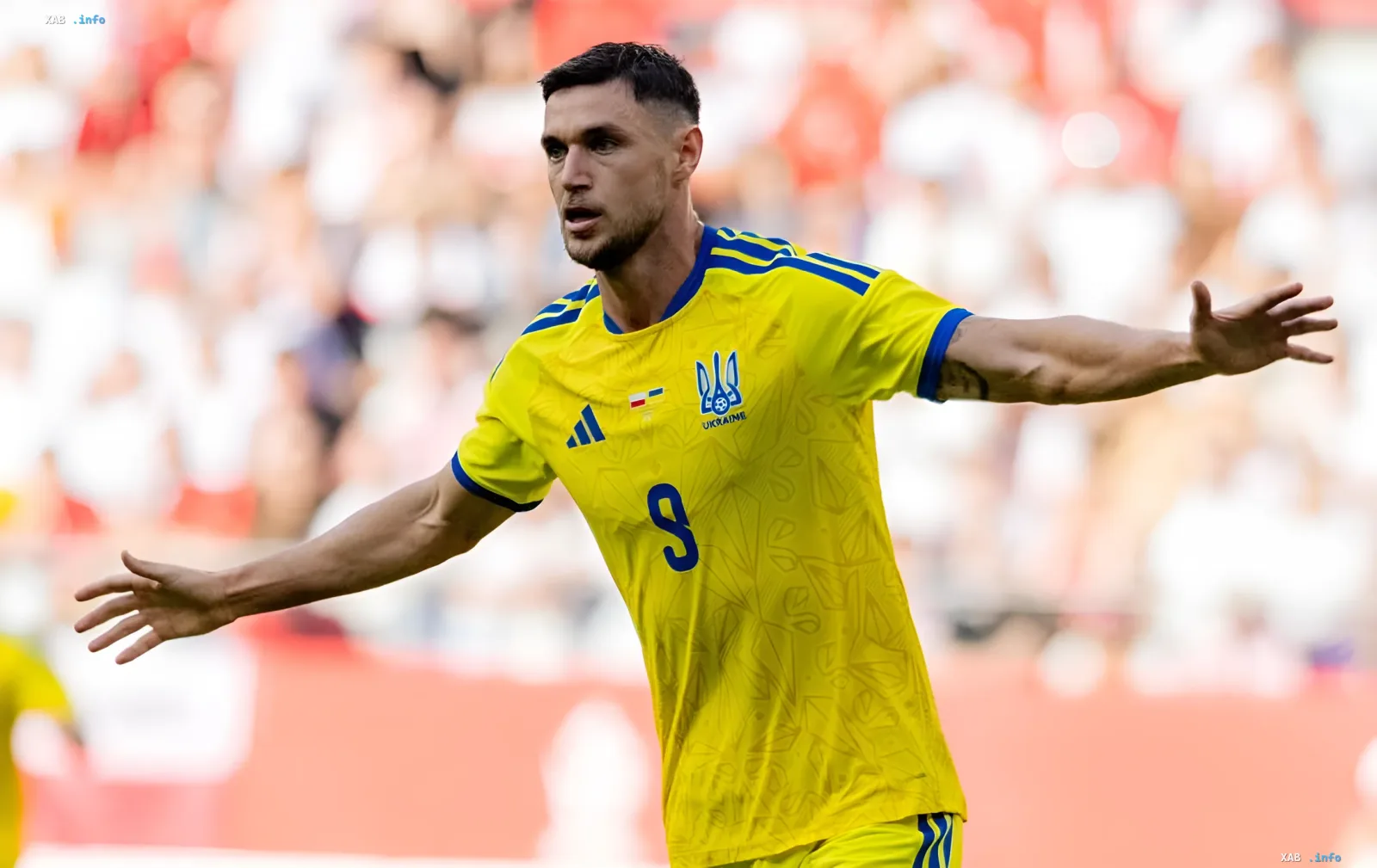 Roman Yaremchuk in the Ukraine national team kit wearing number 9 during a match; the striker was left out of Olympiacos' Europa League 2026/27 squad