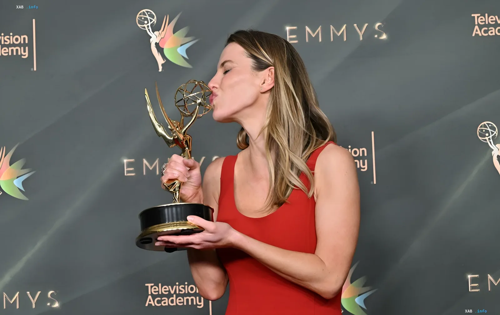 Emmy 2026 winner kisses her statuette in front of the Television Academy press wall