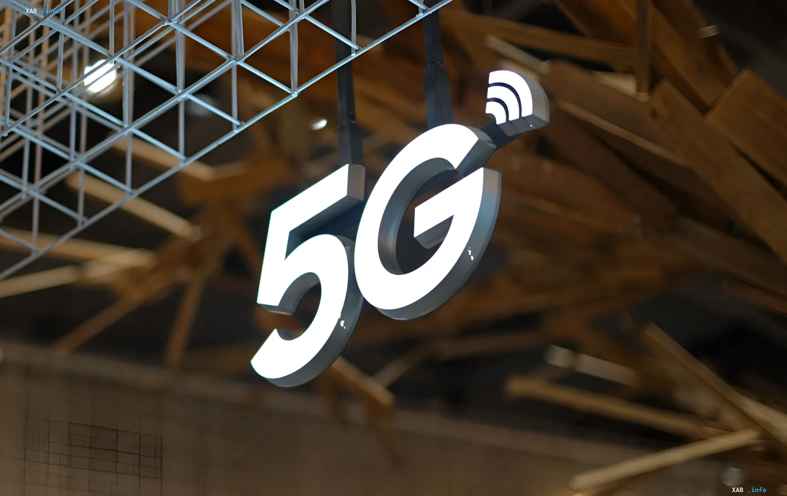 Illuminated 5G sign with a wireless signal icon in an event hall — pilot testing of the fifth-generation network in Odesa