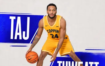 American basketball player Taj Twiat in a Coppin State University jersey holding a ball