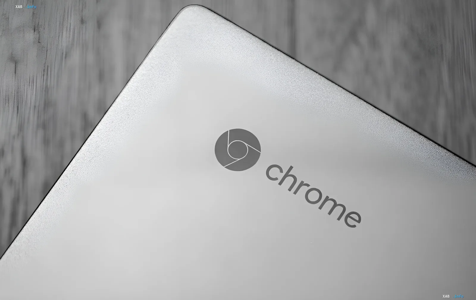 Chrome browser logo on a laptop lid — Chrome 153 update patching 230 vulnerabilities including a V8 zero-day