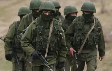 Armed soldiers in masks and camouflage — photo for the story on the execution of two captured National Guard soldiers near Dobropillia