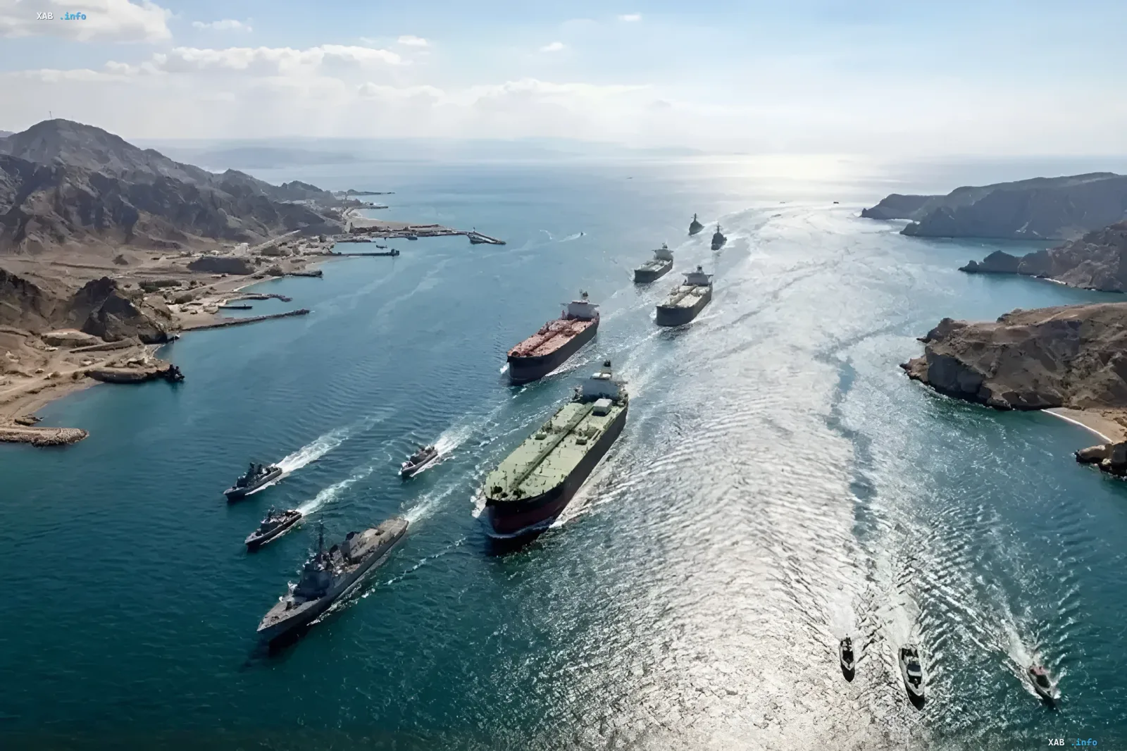 Tanker convoy escorted by warships in the Strait of Hormuz amid Iran's ultimatum to the US