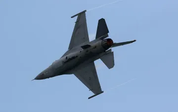 NATO fighter jet on afterburner after emergency scramble due to bird strike risk at Vilnius airport