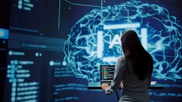 Woman at a laptop in front of a digital globe with AI text, illustrating the theme of cyber recruitment of youth by terrorists