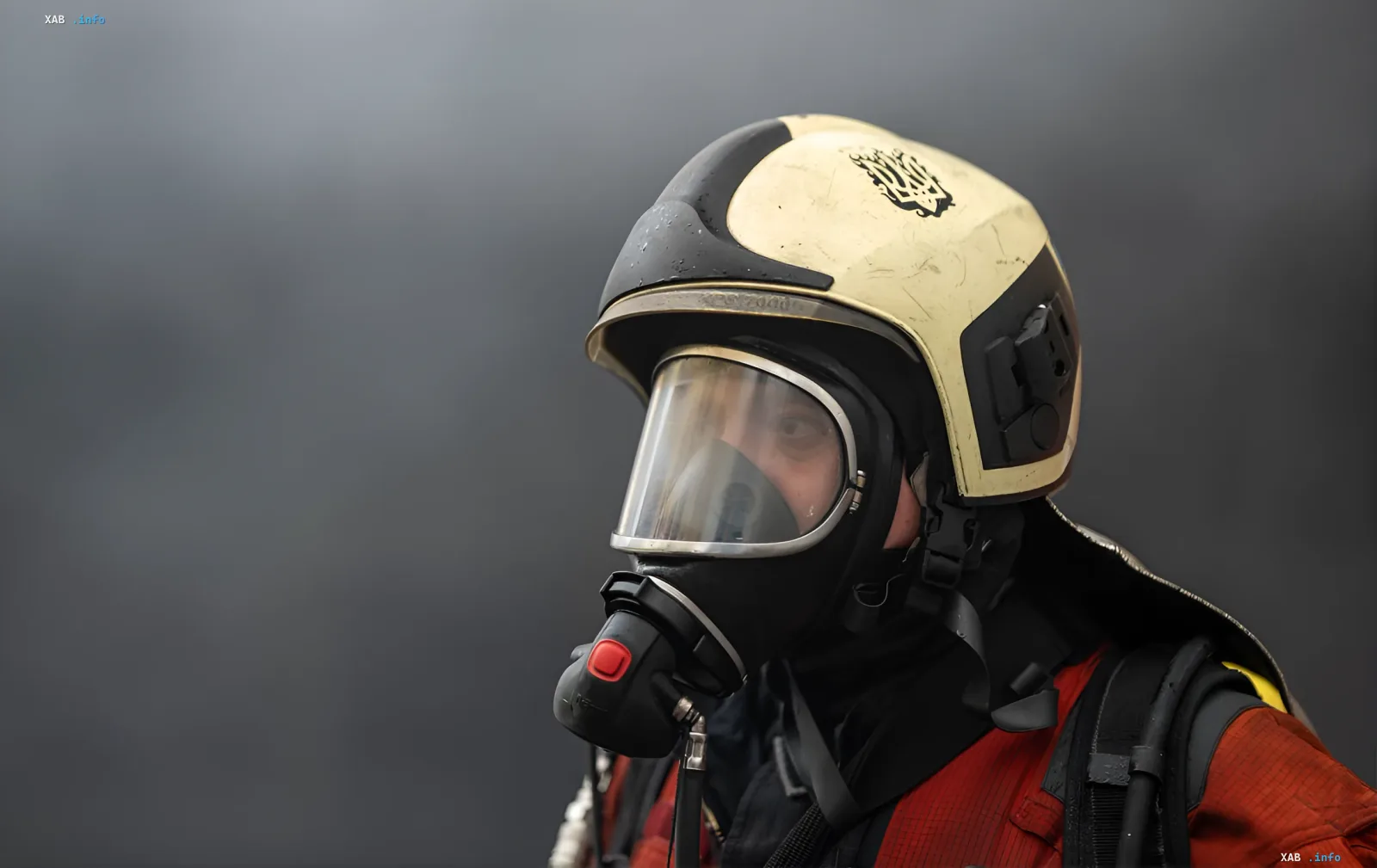 Firefighter in protective helmet and respirator at the scene of a Russian missile strike on Odesa, where the warehouse of pharmaceutical distributor BadM was hit