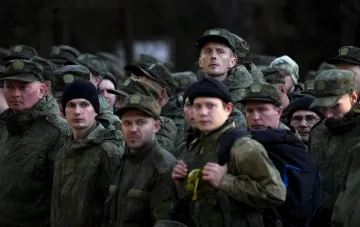 Russian soldiers in camouflage uniform amid the 301,030 troop losses reported by Ukraine's General Staff since the start of 2026
