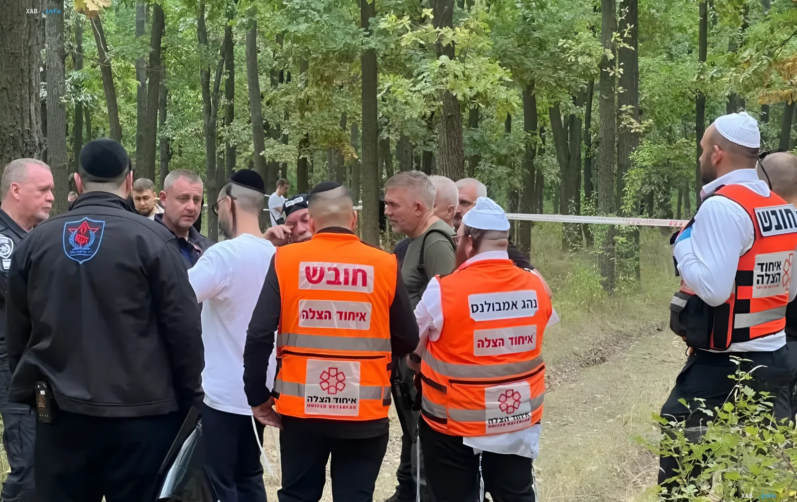 Emergency rescue workers and law enforcement officers at the scene of a body discovery in Uman forest during Rosh Hashanah