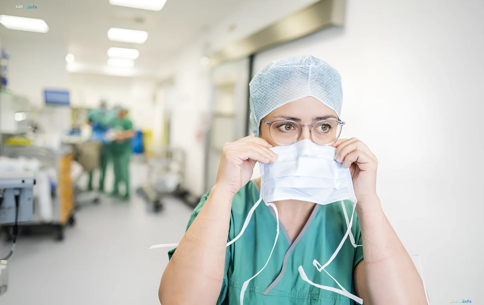 Medical worker in a hospital corridor preparing for duty as Germany readies civilian hospitals for a war scenario