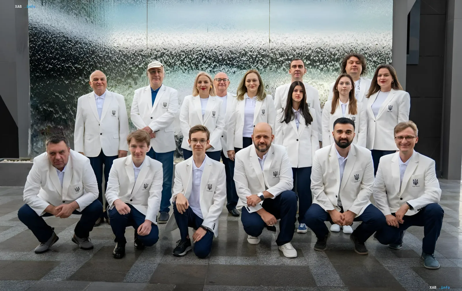 Ukraine chess team in white jackets with trident logo at the Samarkand Chess Olympiad
