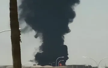 Black smoke and flames rising over Riyadh airport after Houthi attack