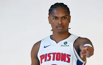 Osar Thompson in a Detroit Pistons jersey after a guaranteed five-year, $155 million contract extension