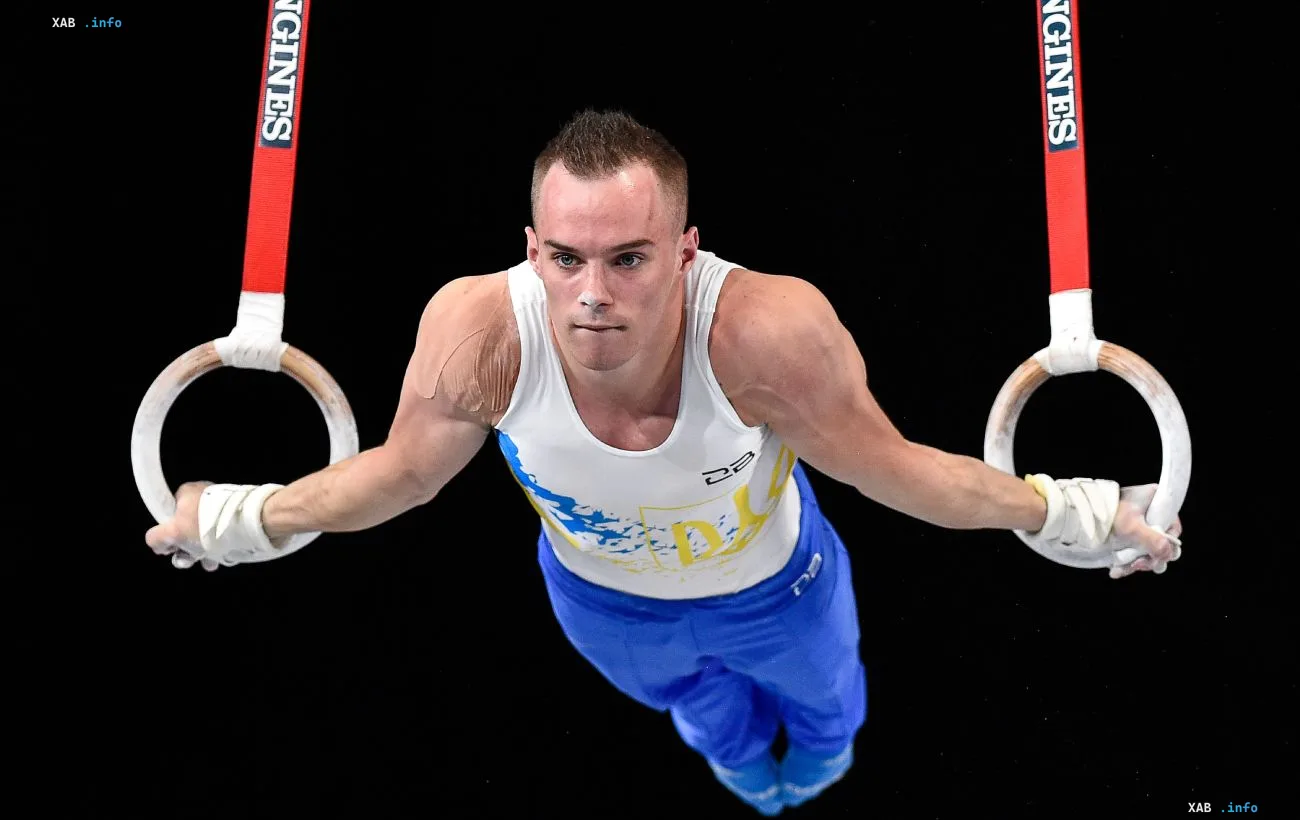 Ukrainian gymnast performing on the still rings at the World Challenge Cup in Hungary