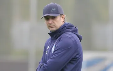 Andriy Shevchenko-era coach Andriy Shovkovsky in blue Dynamo Kyiv gear at a match — insider denies his return as head coach