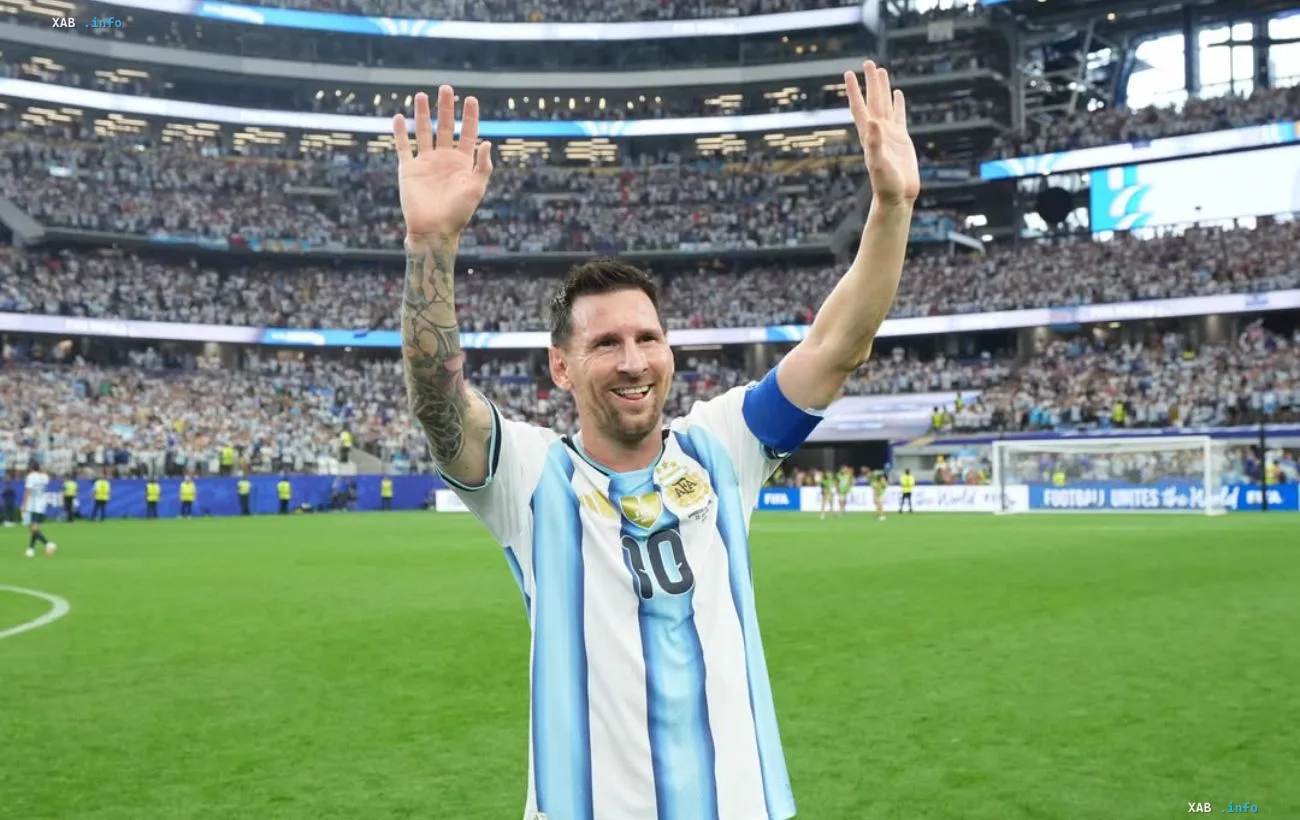 Lionel Messi in Argentina's farewell jersey waves to fans before his final match for the national team