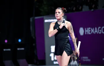 Александра Олейникова на корте в Сингапуре после победы, призывает обратить внимание на гуманитарную катастрофу в Олешках Херсонской области