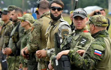 Russian soldiers with 'Z' emblem in formation amid news of failed attacks on the front