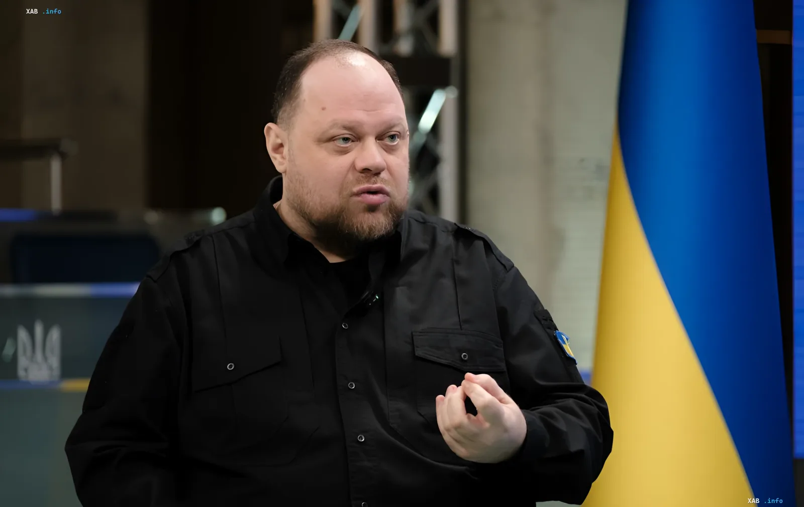 Stefanchuk in front of the Ukrainian flag commenting on why elections in the Diia app are not yet possible