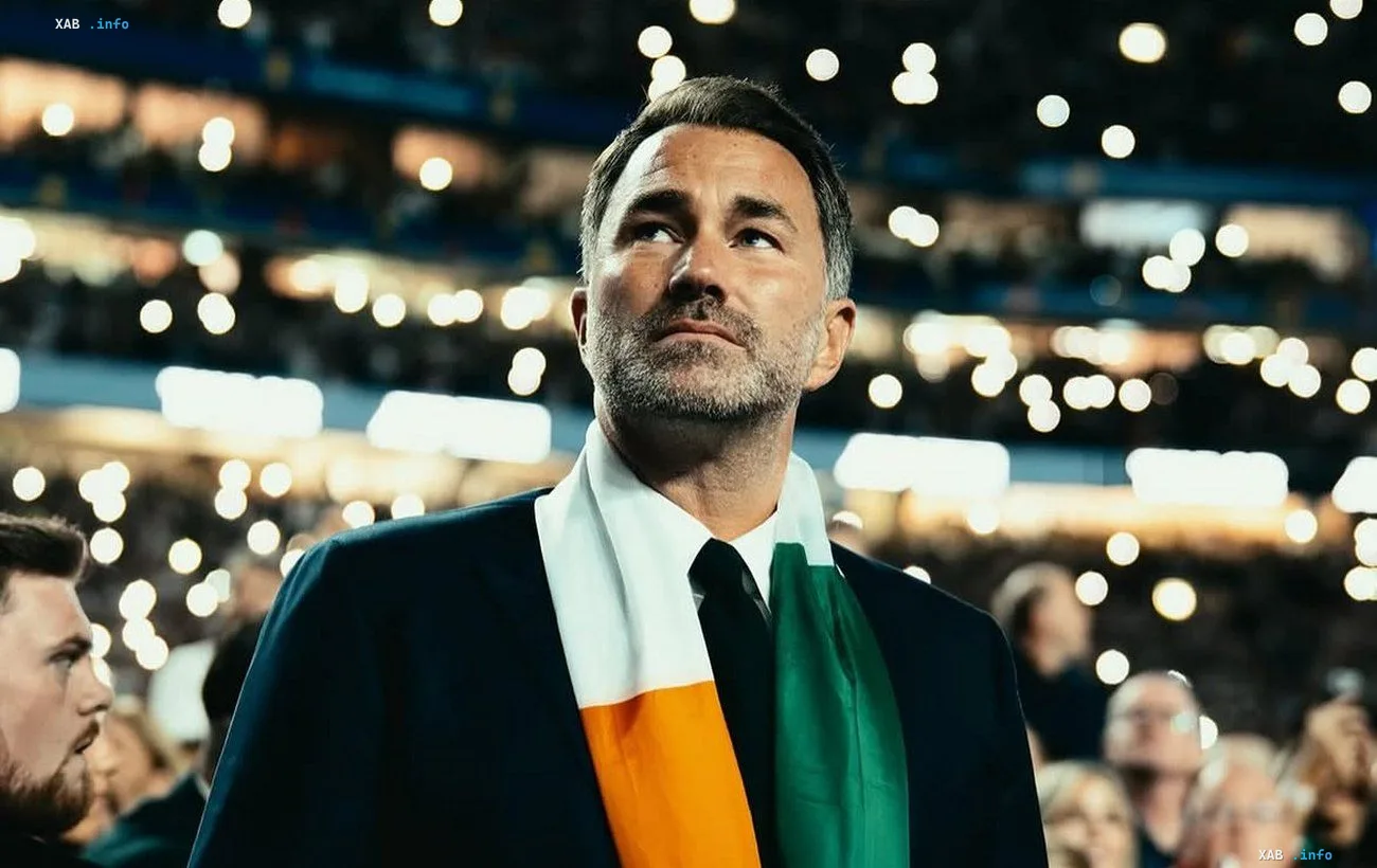 Eddie Hearn with an Irish flag at a stadium at the centre of the Tyson Fury controversy over Anthony Joshua's humiliation