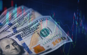 Dollar and euro exchange rate in Ukraine on September 23: candlestick chart over a $100 bill