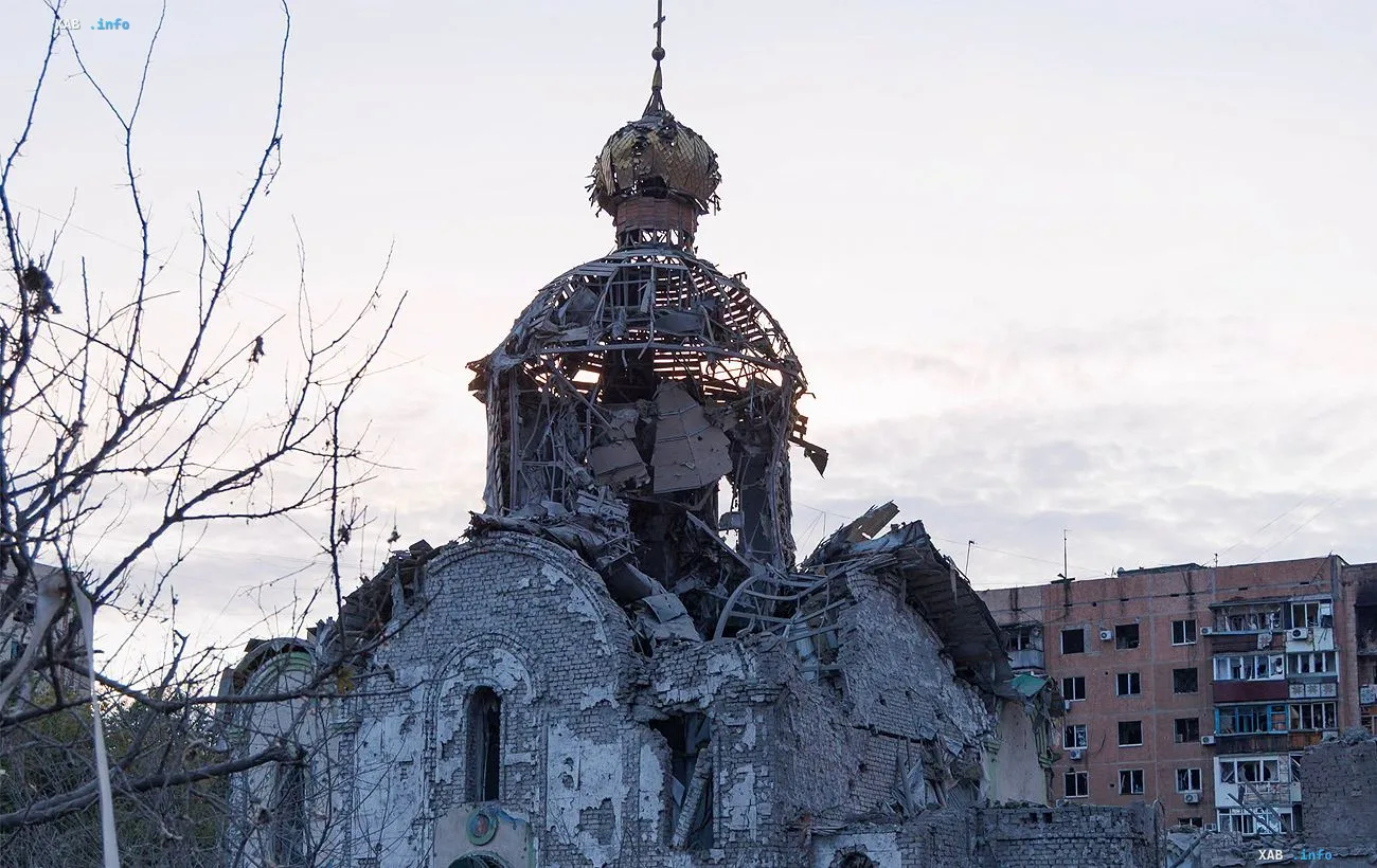 Destroyed Church of John the Baptist in Kramatorsk after a Russian air bomb strike, damaged dome and apartment buildings in the background