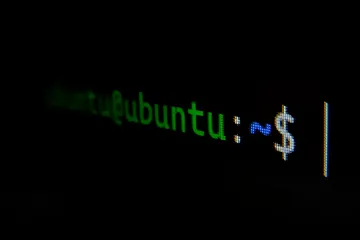 Ubuntu logo and system interface against a background of code and artificial intelligence elements