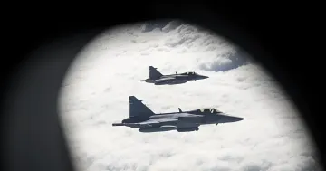 Finnish and Swedish fighter jets flying over the Gulf of Finland