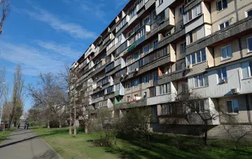 Солнечные панели на крыше многоэтажного дома