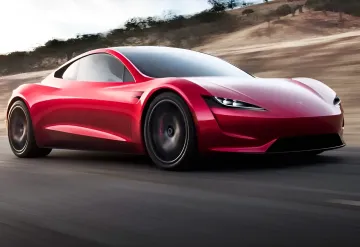 Спортивный электромобиль Tesla Roadster на испытательной площадке