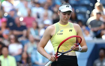 Elena Rybakina on the tennis court during a match