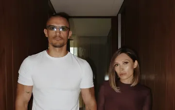 Taras Tsymbalyuk and Olena Svitlytska showcasing new matching tattoos