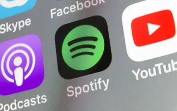 Интерфейс Spotify с новой функцией прослушивания аудиокниг в Украине