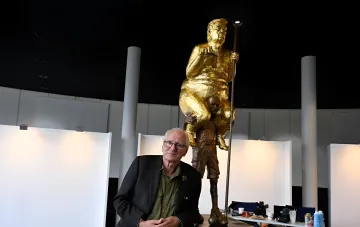 Golden statue of Donald Trump The Orange Plague in the European Parliament