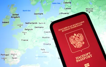 European Union flags and discussion on visa restrictions for Russian citizens in Brussels