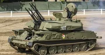 ZSU-23-4 Shilka self-propelled anti-aircraft system guarding a facility