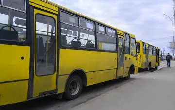 Minibus in Ivano-Frankivsk against the background of the street