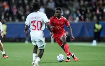 Ivan Dibango celebrating an assist in the Champions League match