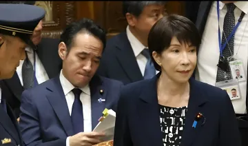 Japanese Agriculture Minister Kazuo Yana speaking to the press